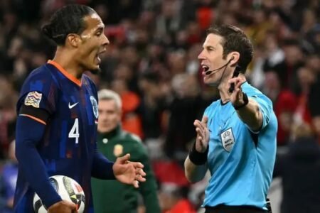 Netherlands captain Van Dijk was shown the first red card of his international career
