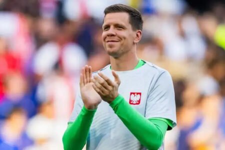 Wojciech Szczesny applauds supporters after a Poland match at Euro 2024