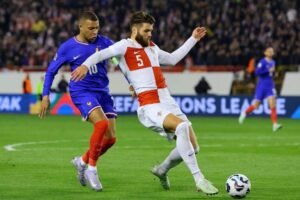 Croatia's Duje Caleta-Car in action with Frances Kylian Mbappe 1