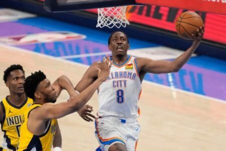 Oklahoma City Thunder forward Jalen Williams shoots against Indiana Pacers center Tony Bradley during the third quarter of game five of the 2025 NBA Finals at Paycom Center. Kyle Terada-Imagn Images.
