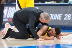 Indiana Pacers guard Tyrese Haliburton (0) reacts after suffering an injury during the first quarter against the Oklahoma City Thunder during game seven of the 2025 NBA Finals at Paycom Center. Mandatory Credit: Kyle Terada-Imagn Images