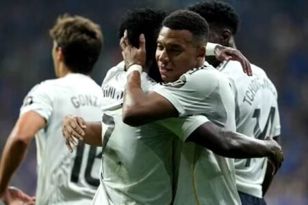 Real Madrid's Kylian Mbappe celebrates with teammates after scoring his side's second goal against Real Oviedo - Jon Radcliffe